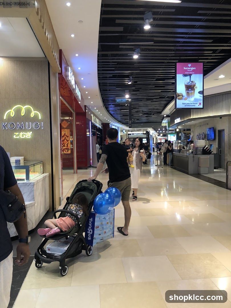 Mall Interior with Shops and People