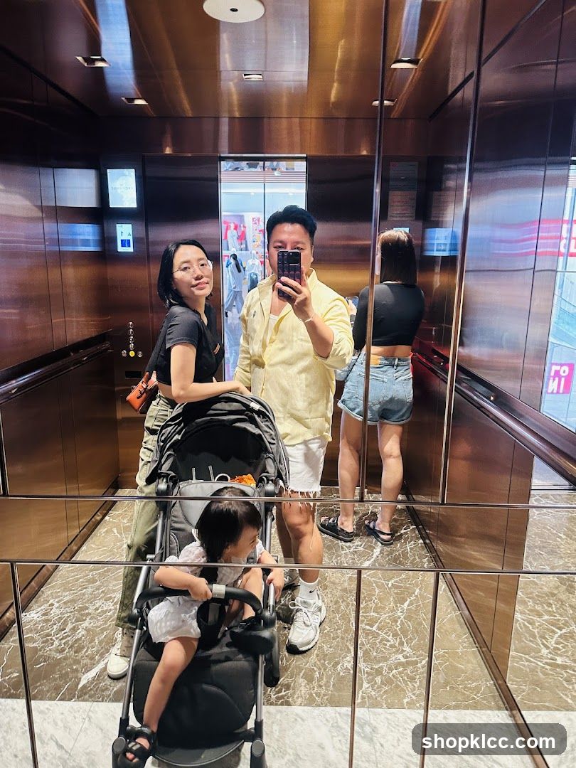 Family taking a selfie in an elevator