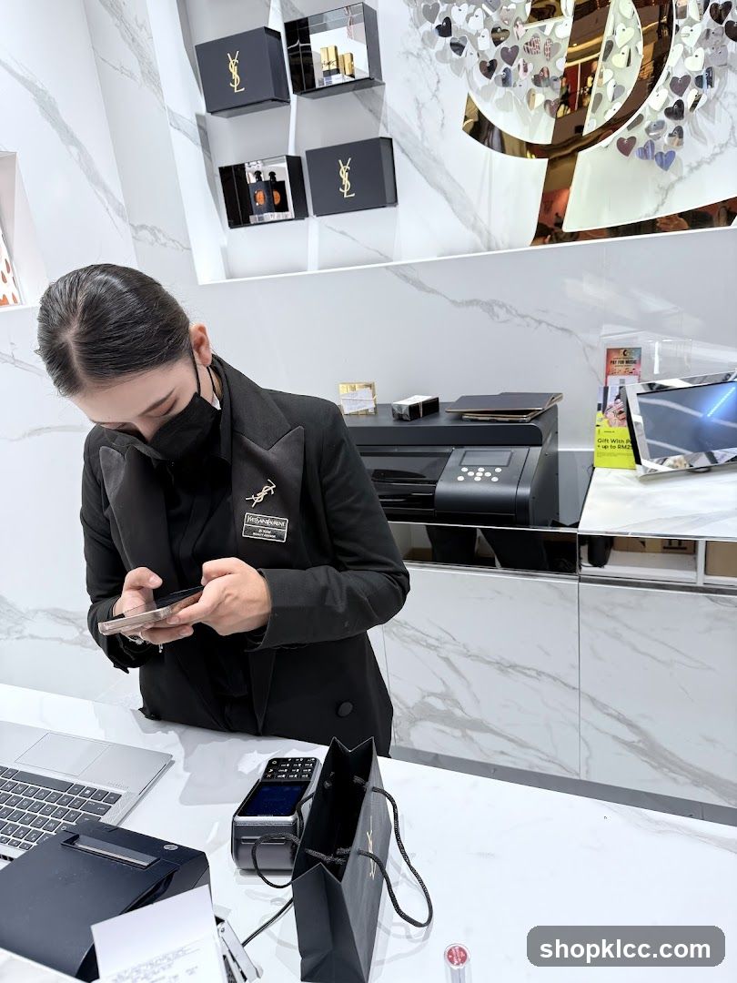 Sales Associate Using Phone at Counter