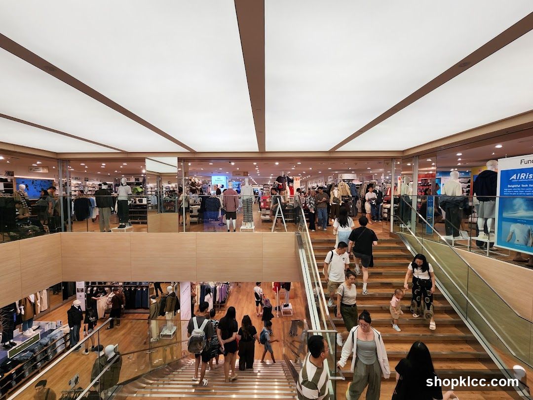 Busy clothing store interior with shoppers