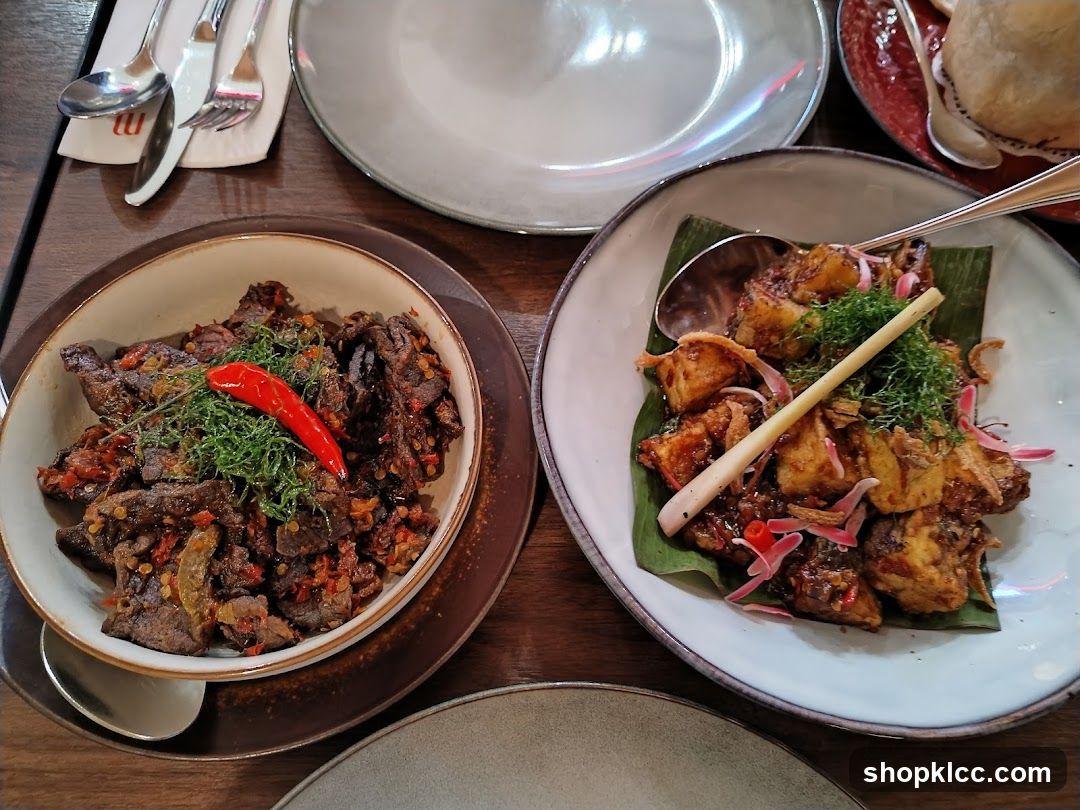 Two dishes of food on a table
