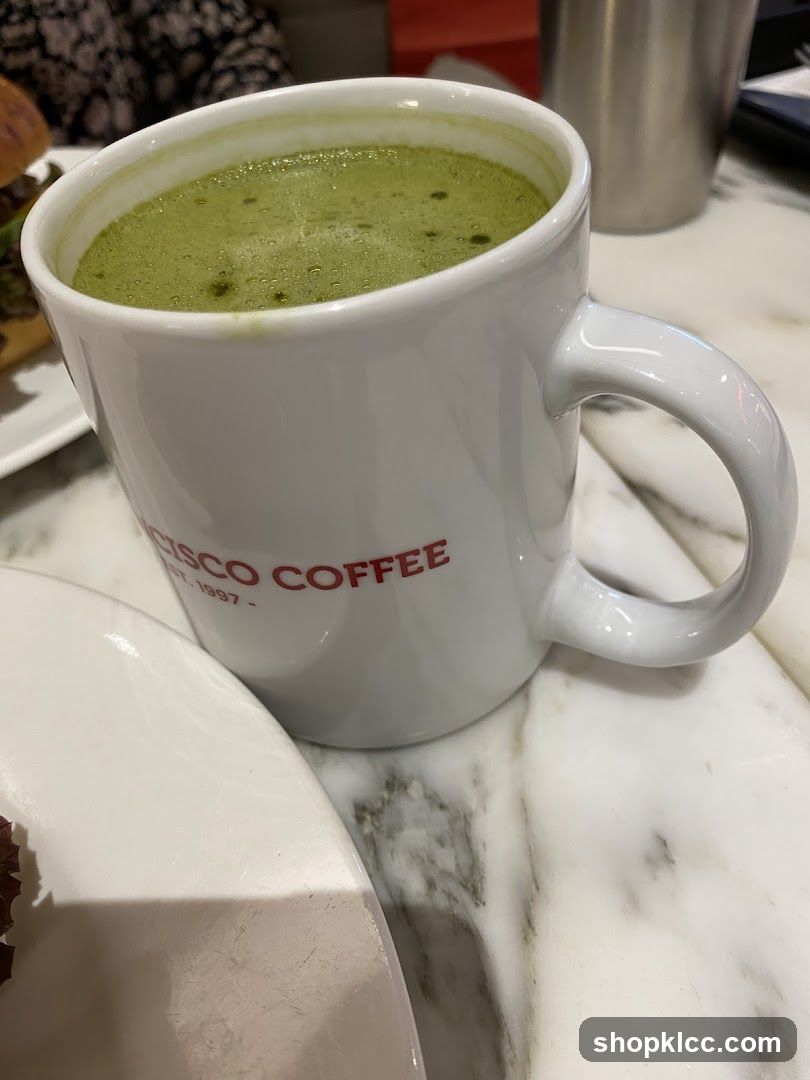 Matcha Latte in a Branded Mug
