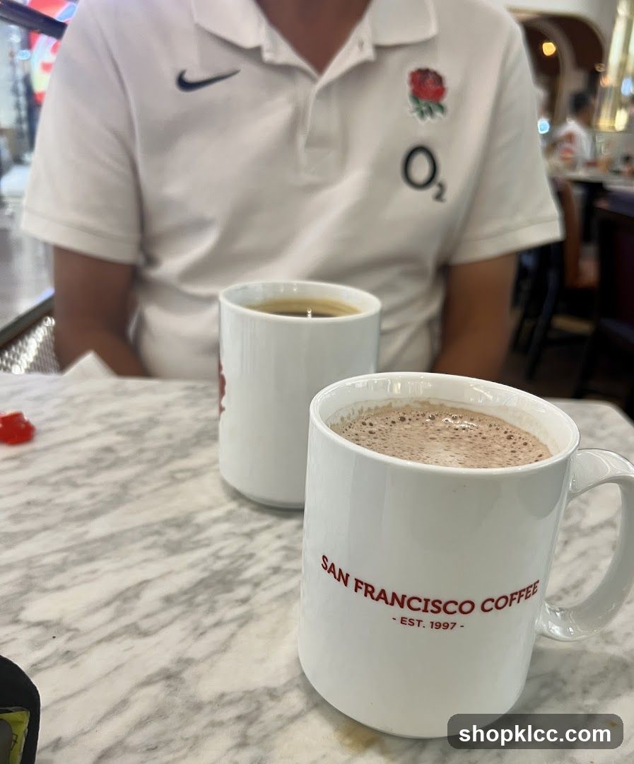 Two Mugs of Coffee on a Marble Table