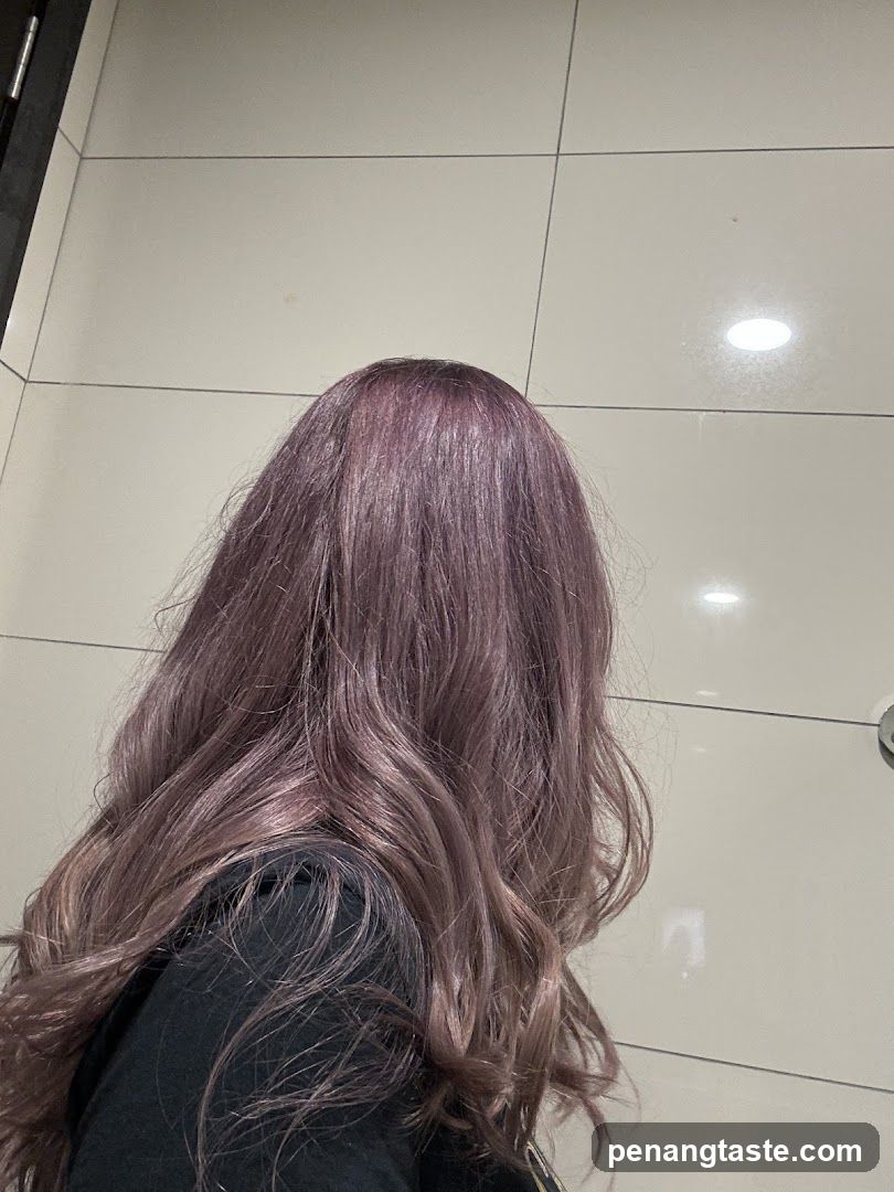 Woman with purple-toned hair