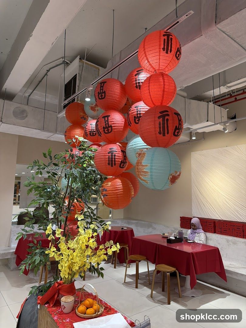 Restaurant interior decorated with lanterns and flowers