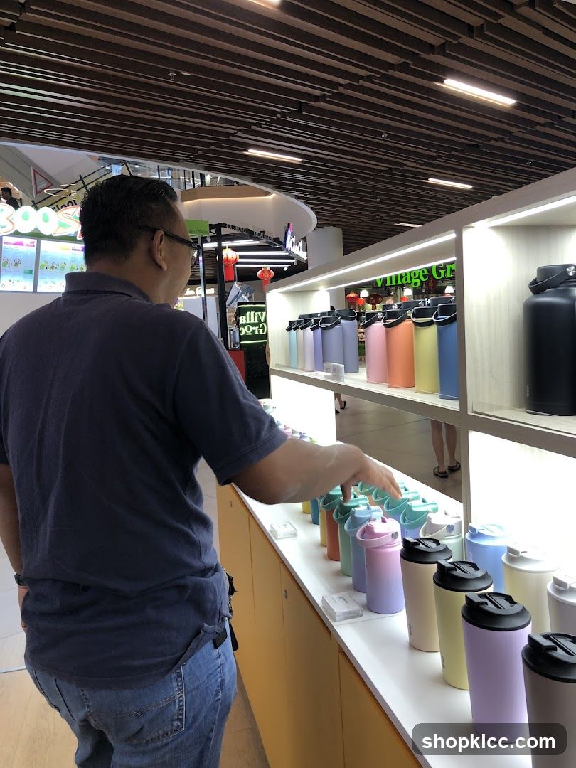 Man browsing water bottles