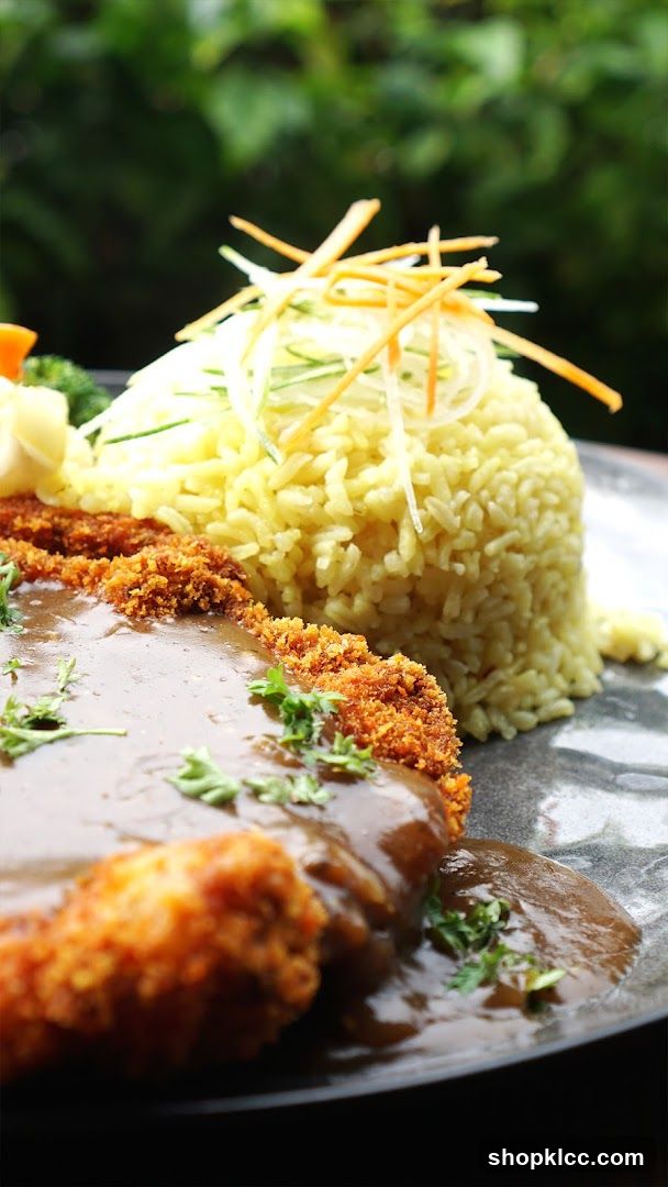 Breaded Cutlet with Rice and Vegetables
