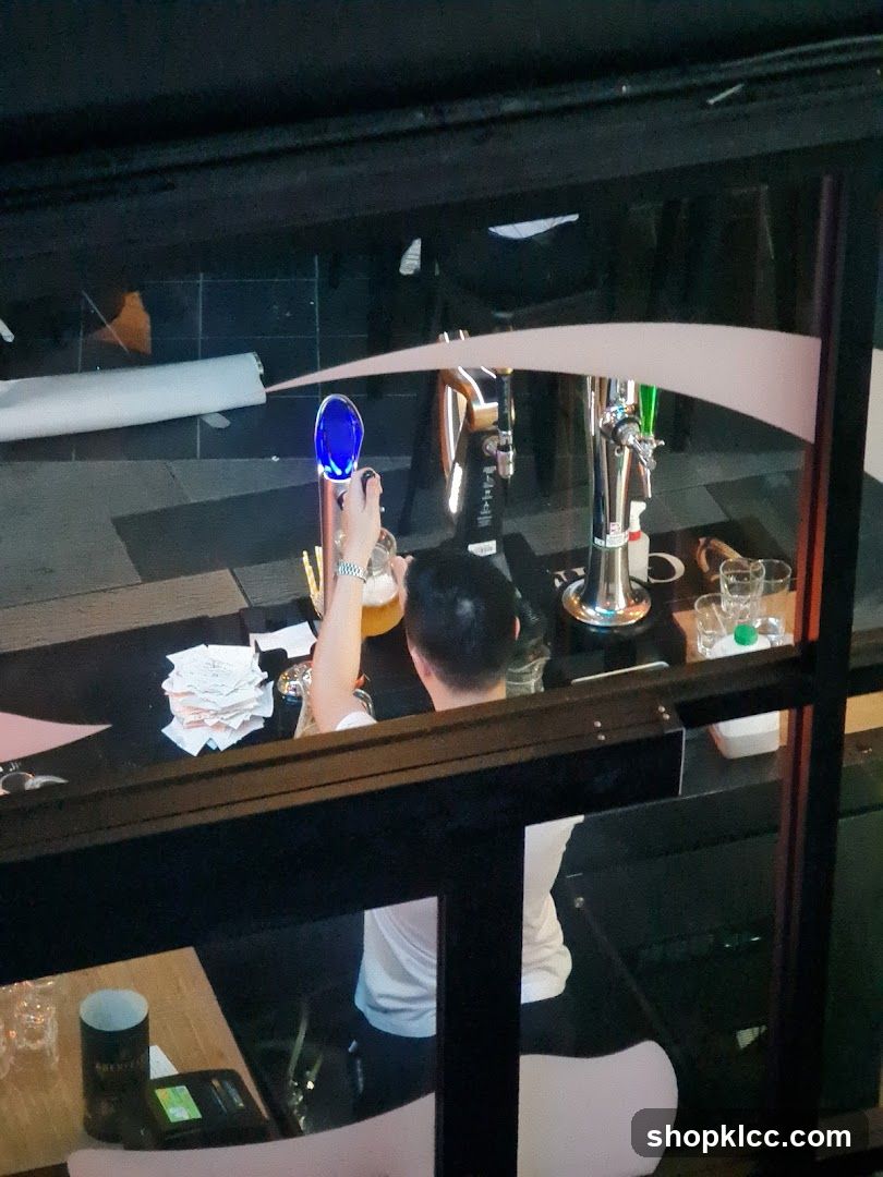 Bartender pouring a beer