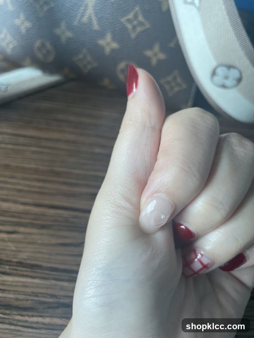 Close-up of a hand with manicured nails