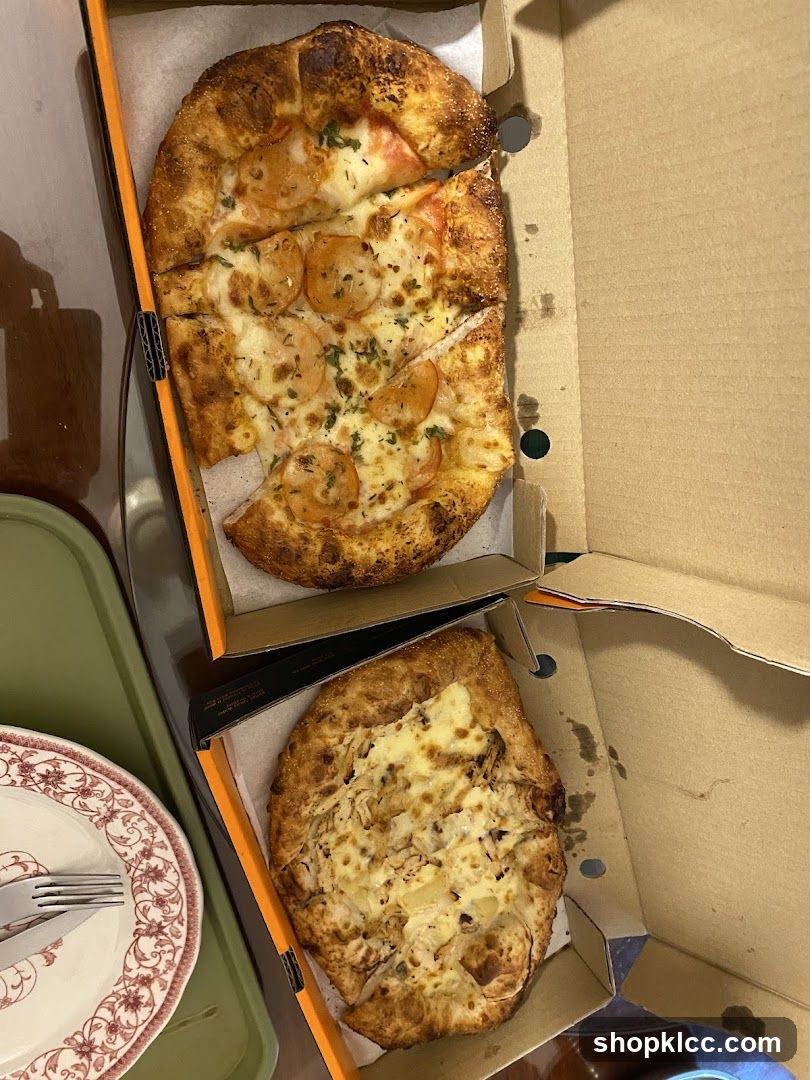 Two Pizzas in Boxes