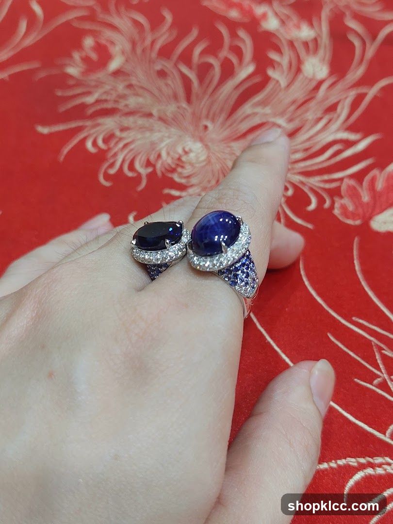 Sapphire and Diamond Rings on Finger