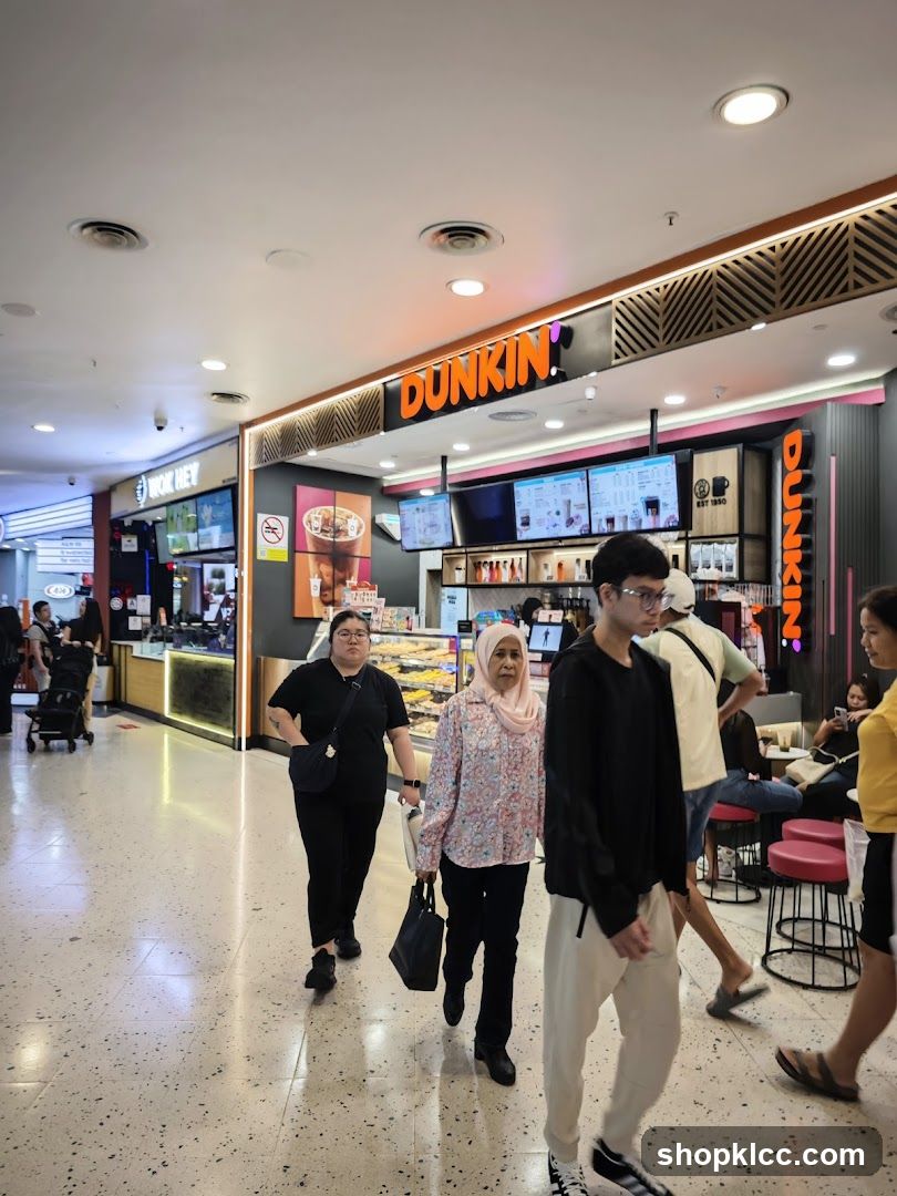 Dunkin' and other shops in a mall