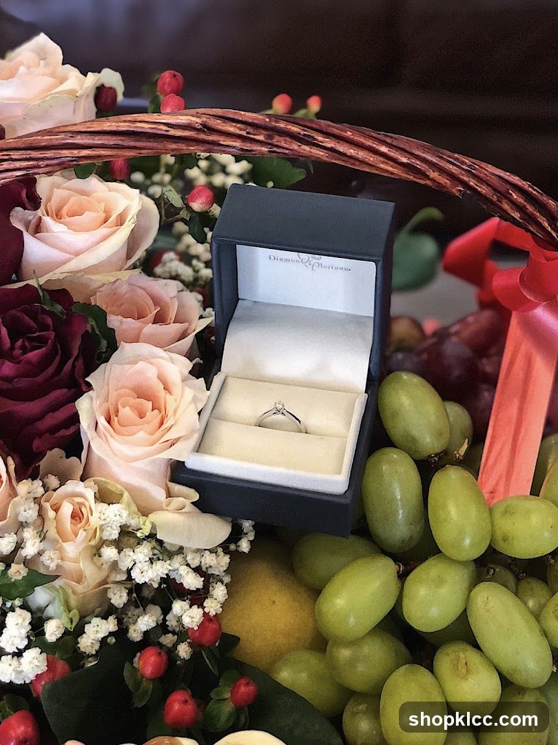 Ring in a basket with flowers and grapes