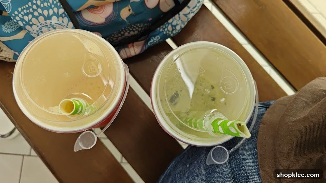 Two drinks with straws