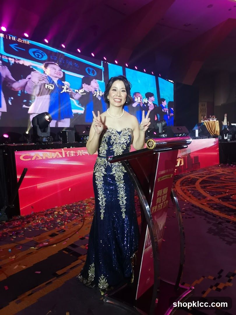 Woman posing at podium during event