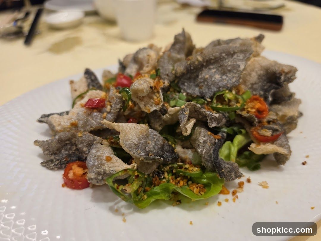 Crispy Fish Skin Salad with Chili and Greens