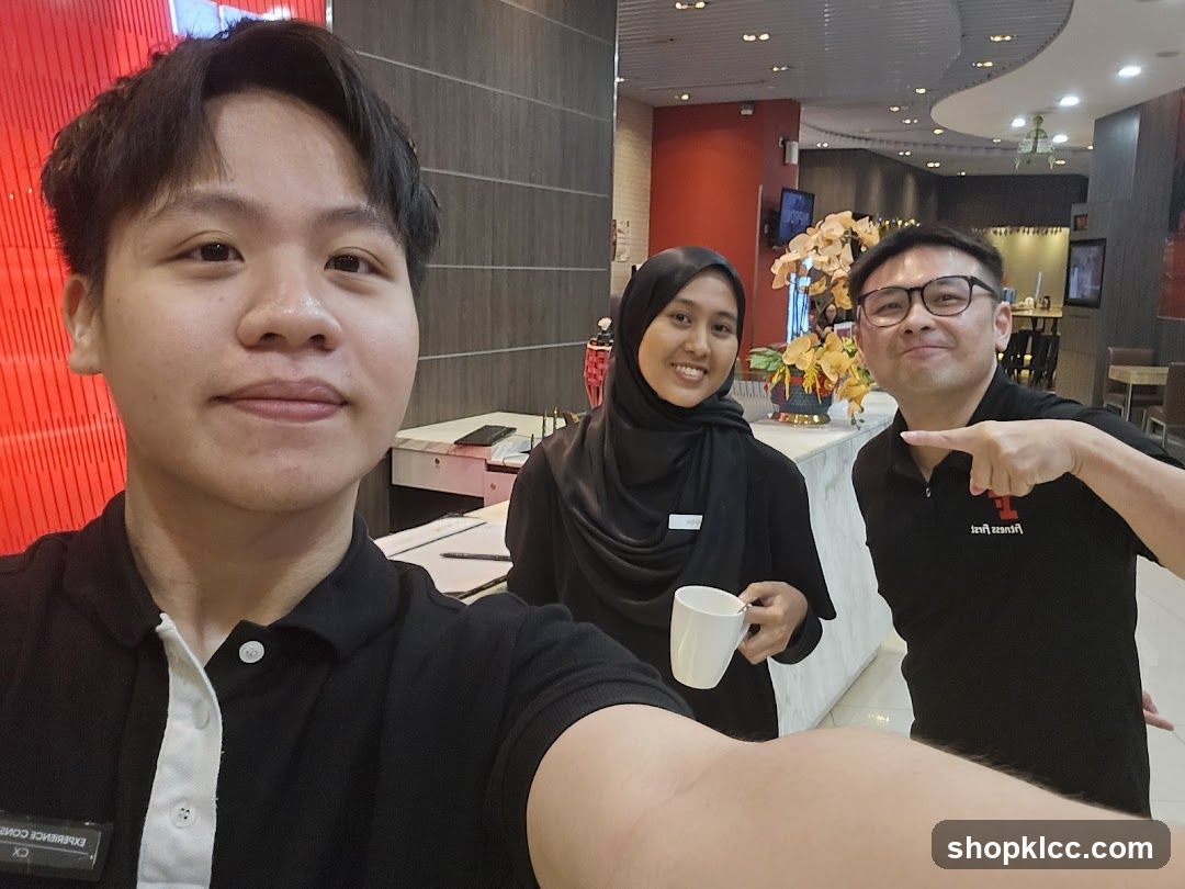 Three people posing for a selfie