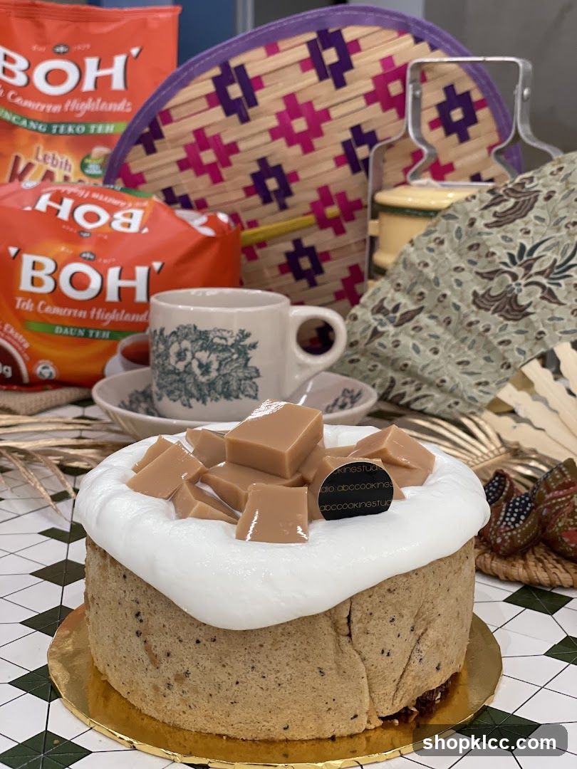 Tea-themed cake with BOH tea packaging