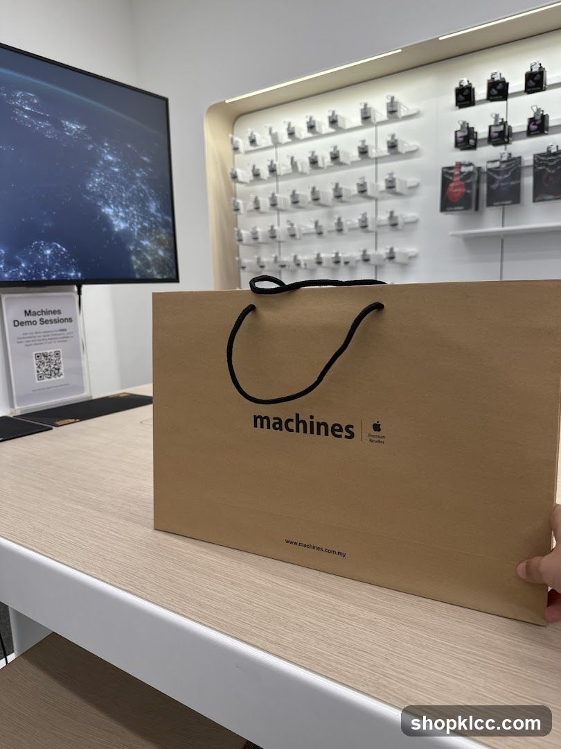 Brown paper shopping bag with "machines" logo