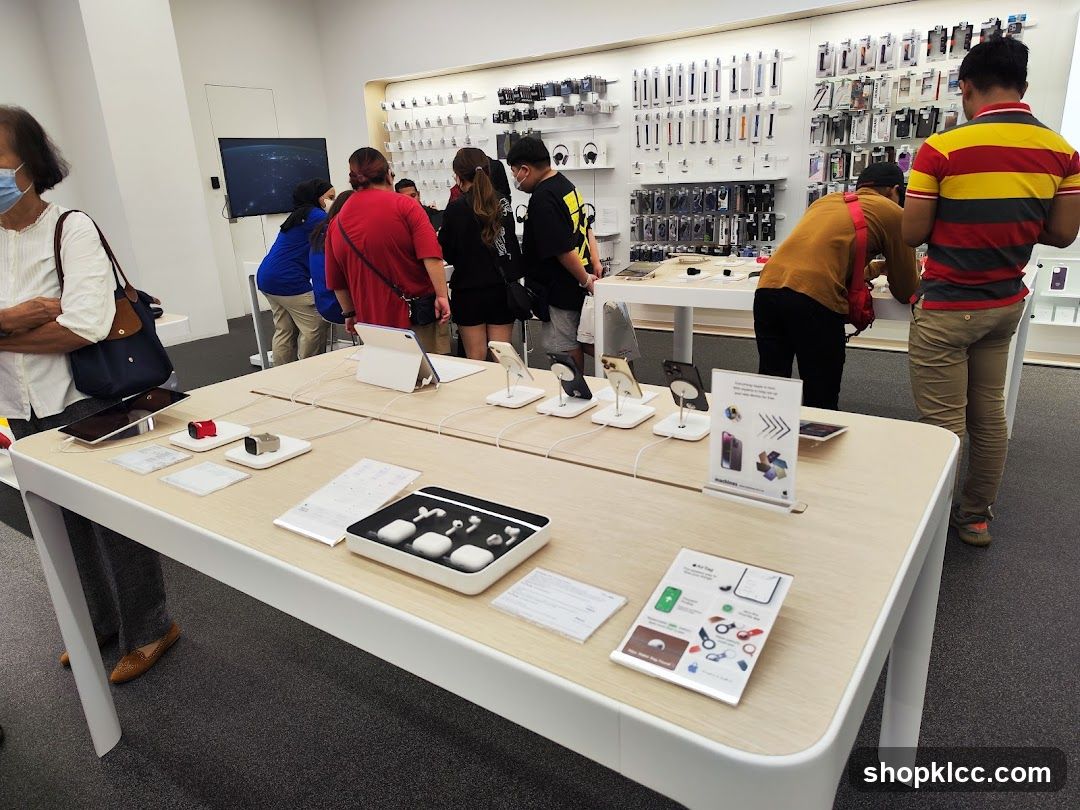 Customers browsing electronics in a store