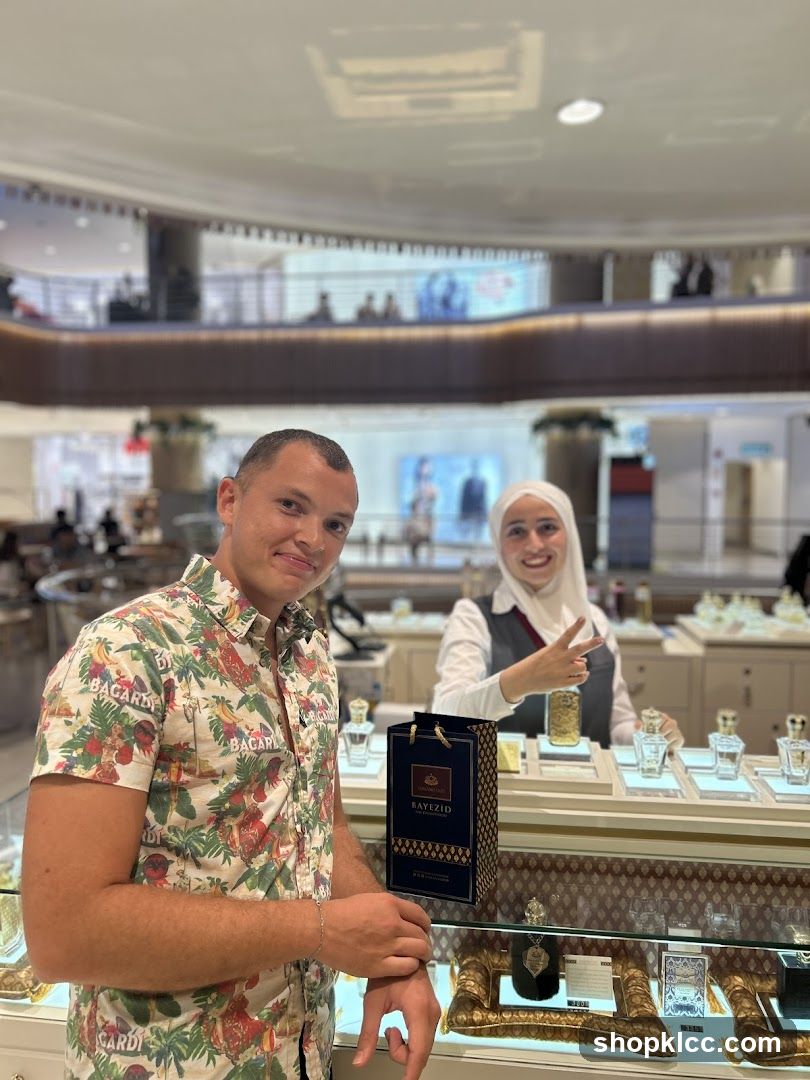 Perfume Shop Interior with Staff and Customer