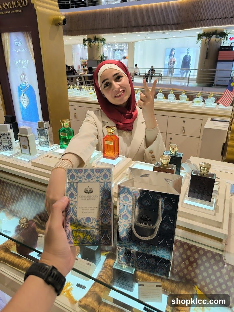 Perfume Shop Interior with Staff and Products