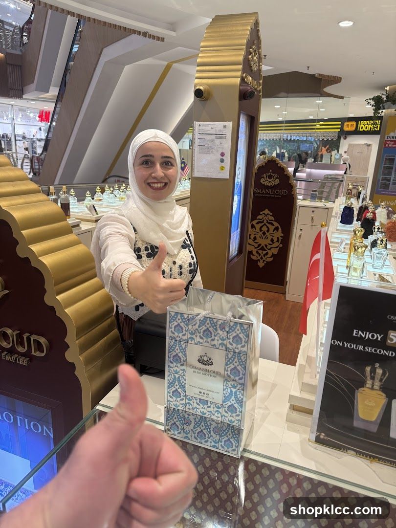 Perfume Shop Interior with Staff and Gift Bag