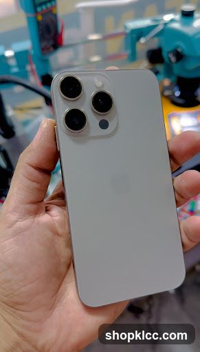 iPhone in hand