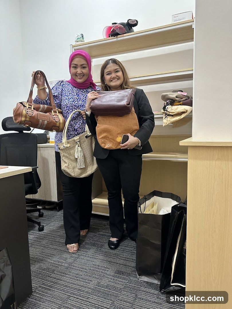 Two women holding handbags