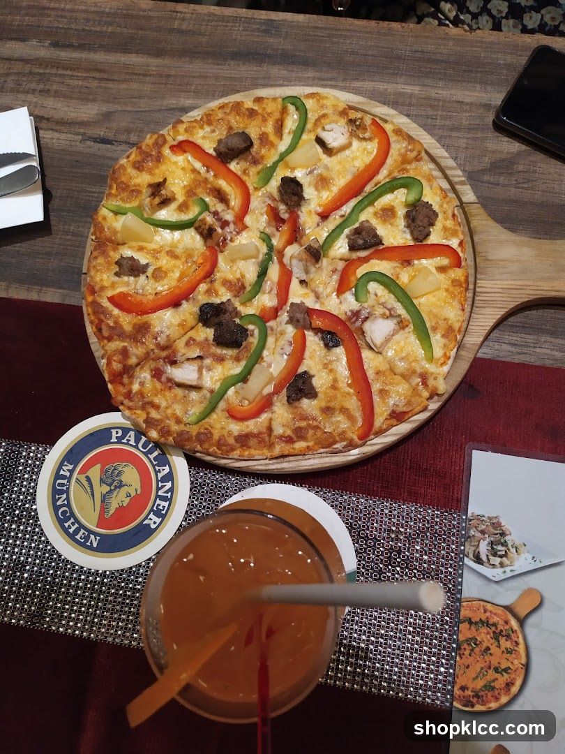 Pizza and Drink on Table