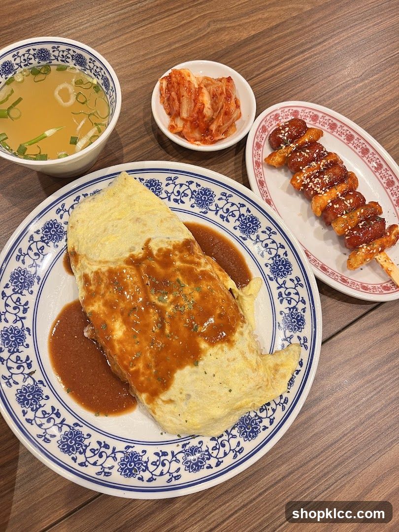 Japanese-style meal with omurice and side dishes