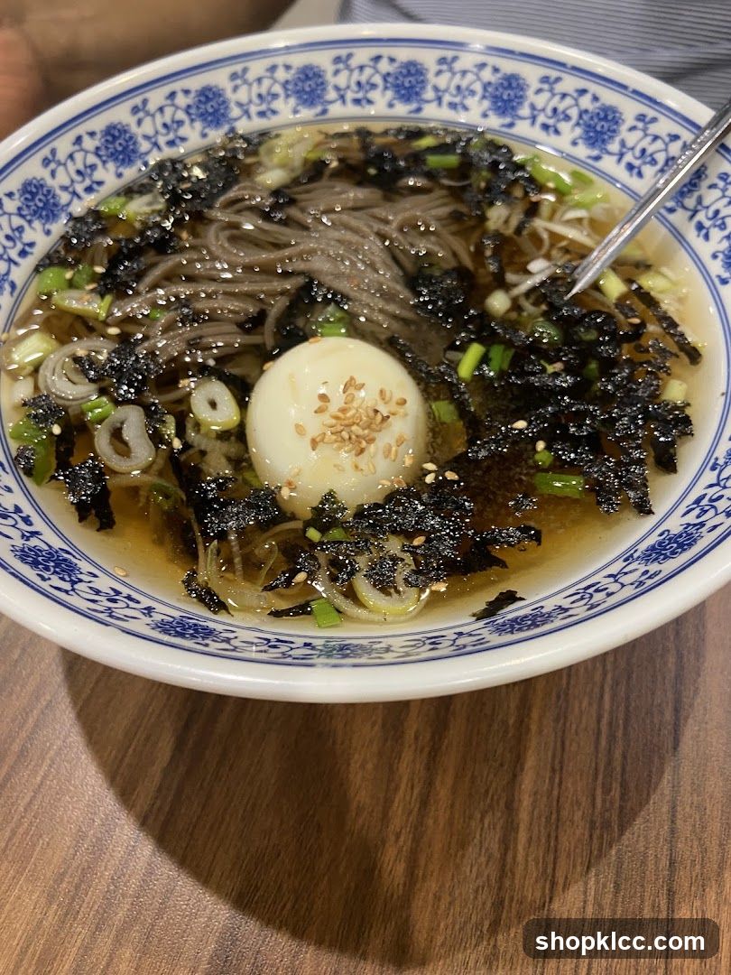 Bowl of Soba Noodles with Soft-Boiled Egg and Toppings