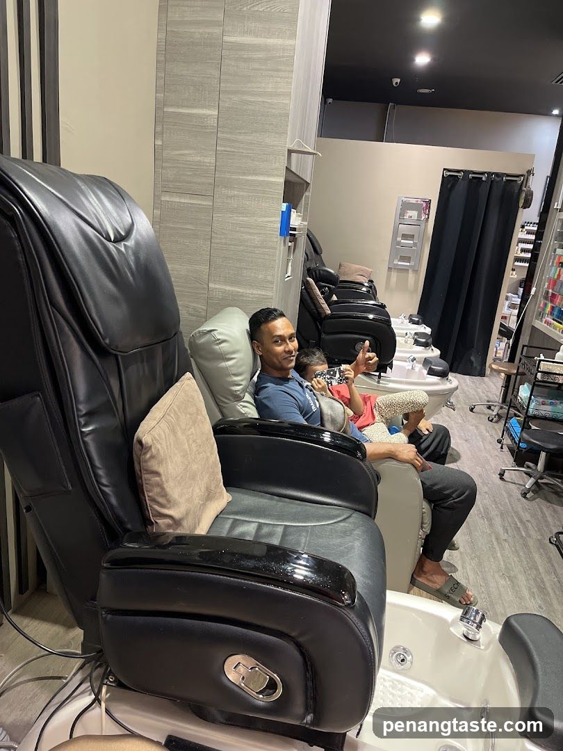 People relaxing in pedicure chairs