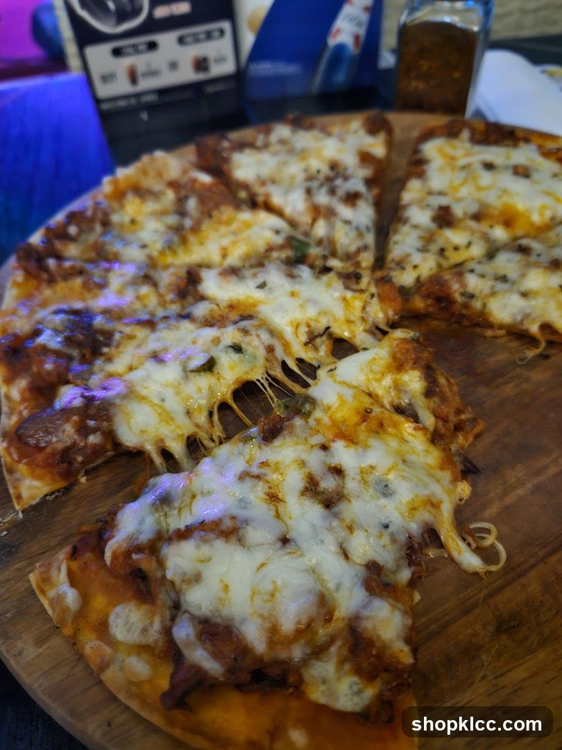 Cheese Pizza on Wooden Board