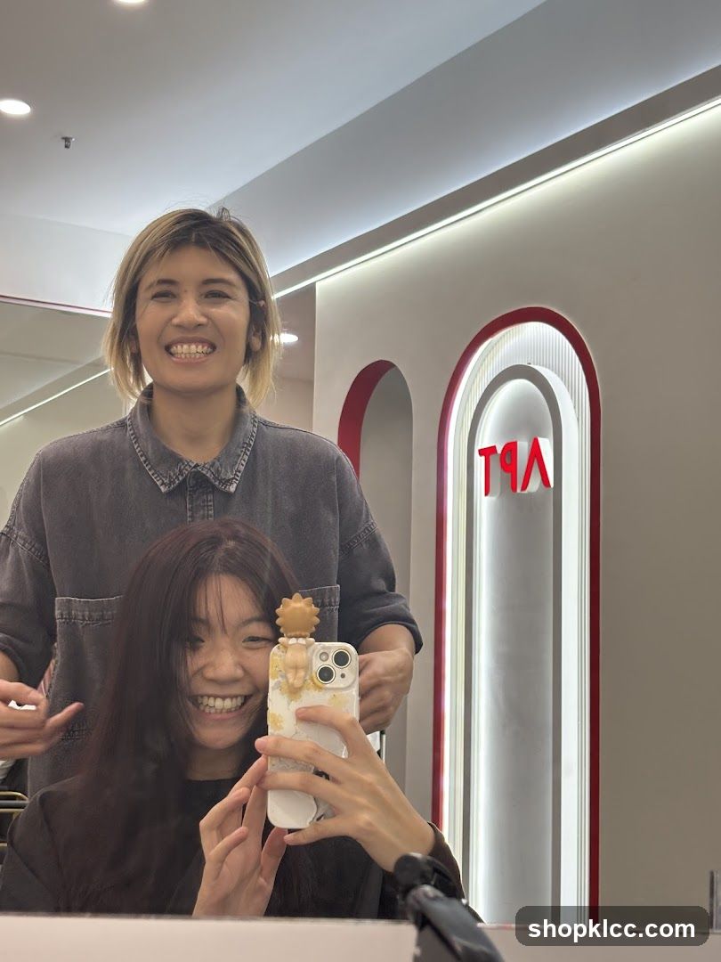 Two smiling women in a salon
