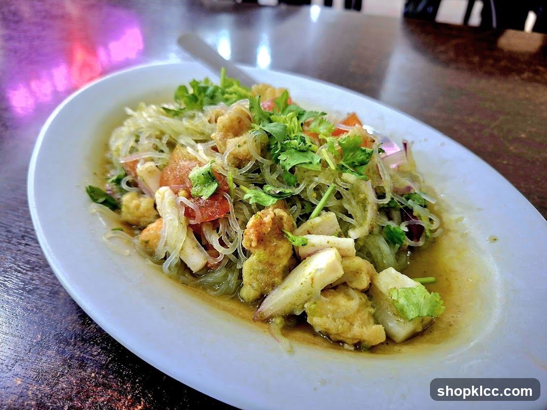 Spicy Noodle Dish with Crispy Toppings