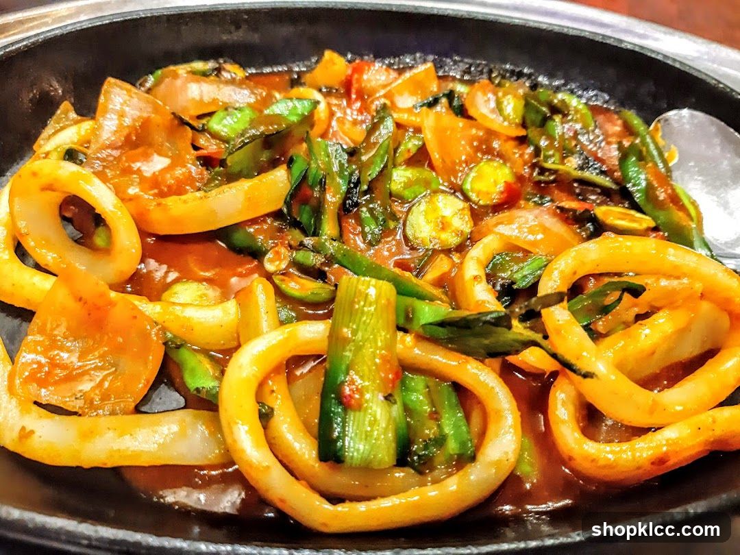 Sizzling Korean-style seafood dish in a clay pot