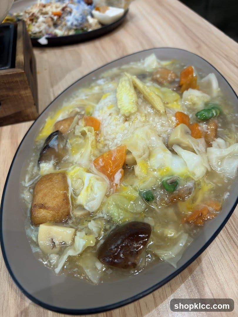 Rice with mixed vegetables and gravy