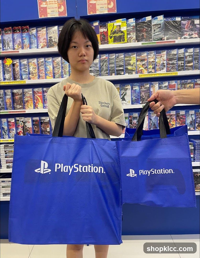 Girl holding PlayStation bags in store
