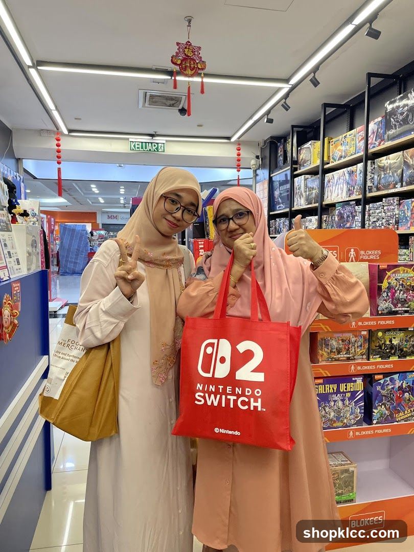 Two women in a store aisle
