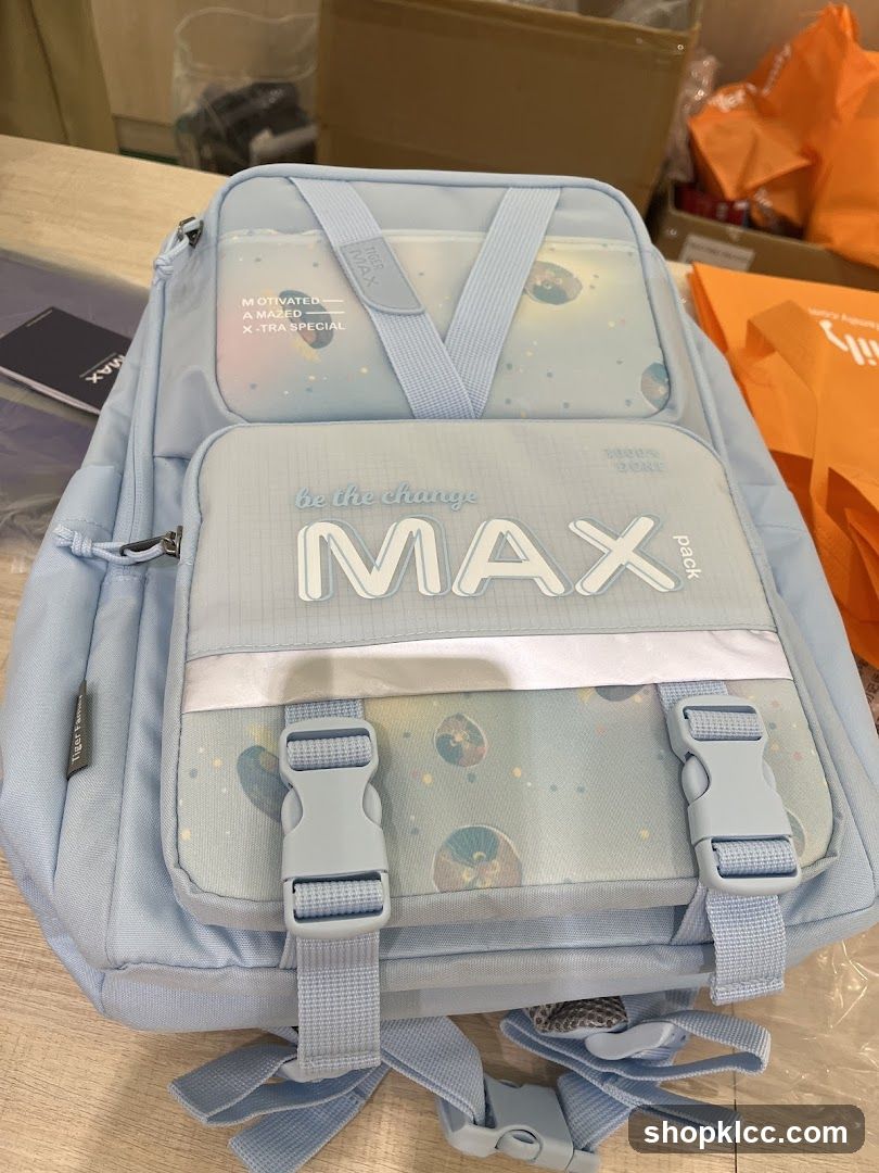 Blue Backpack with 'MAX' Design