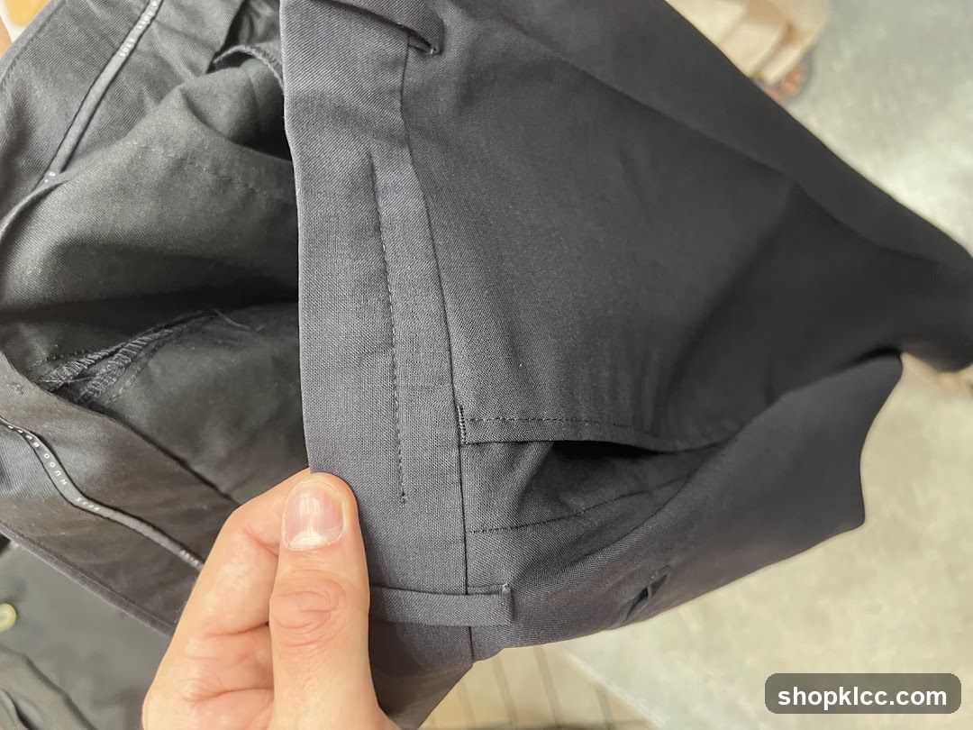 Close-up of black trousers