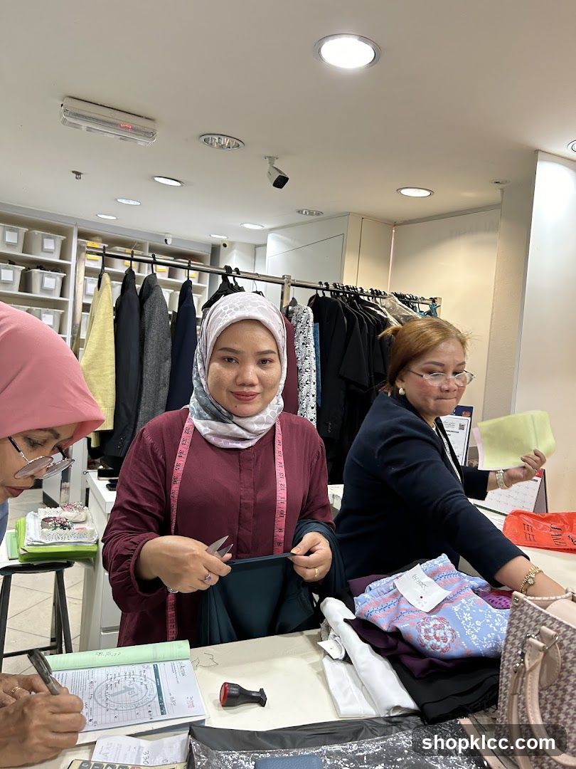 Tailors working on garments