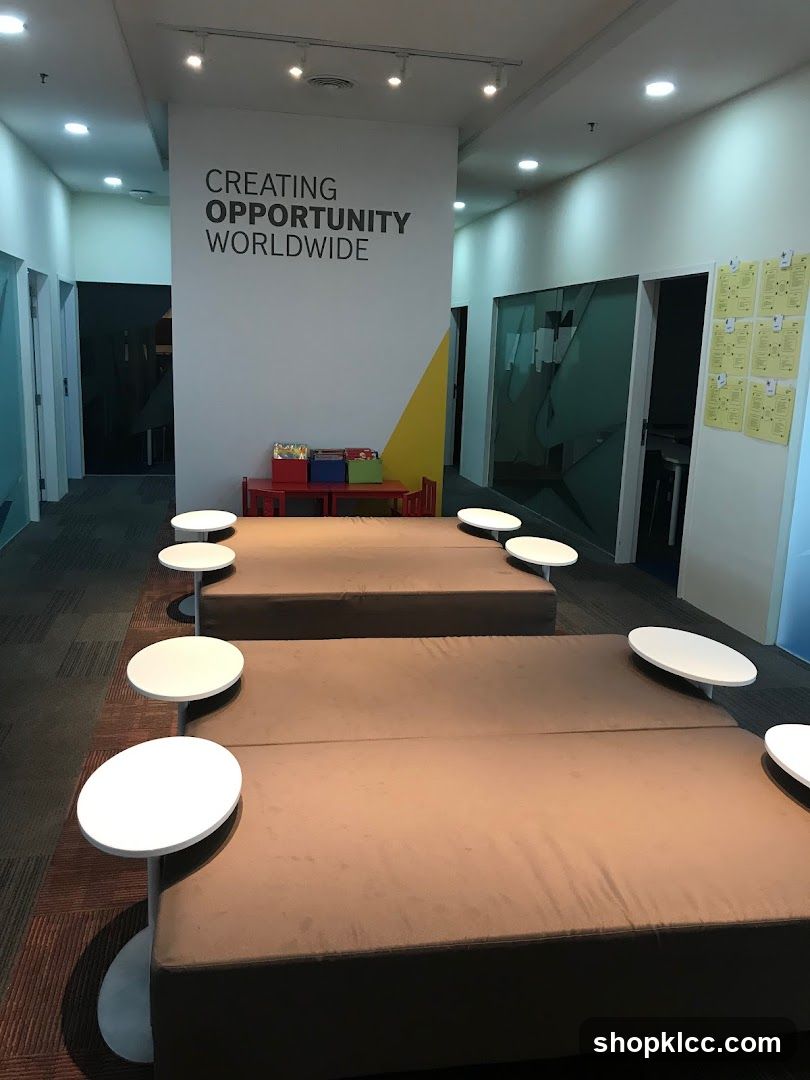 Office common area with seating and motivational text