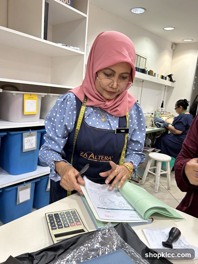 Seamstress working at a tailor shop