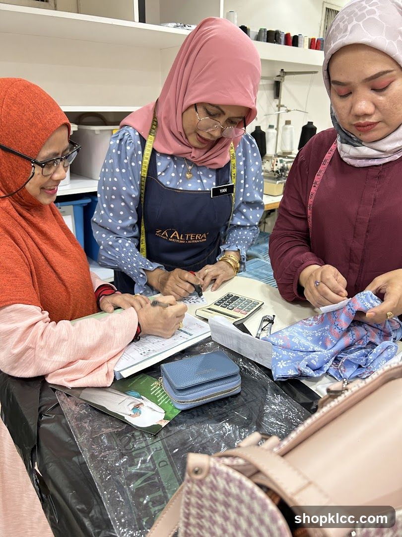 Three women working at a table