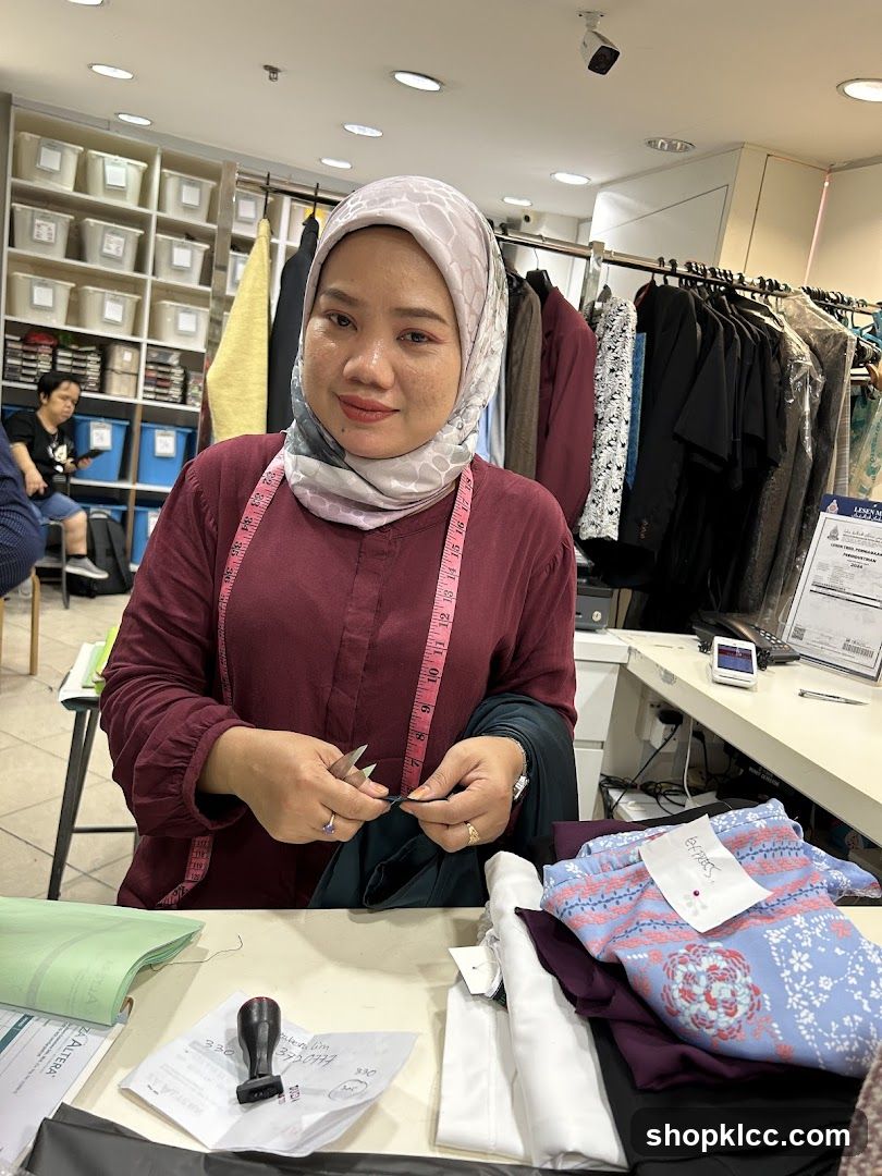 Seamstress working in a tailor shop