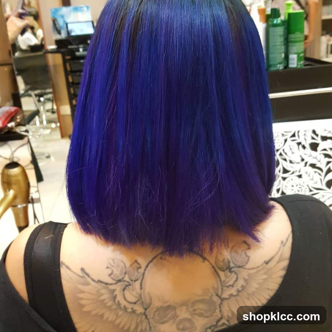Woman with Blue Hair and Skull Tattoo