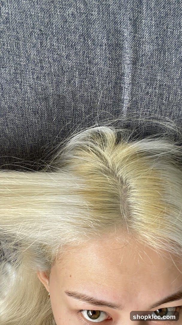 Close-up of a person's hair and eyes