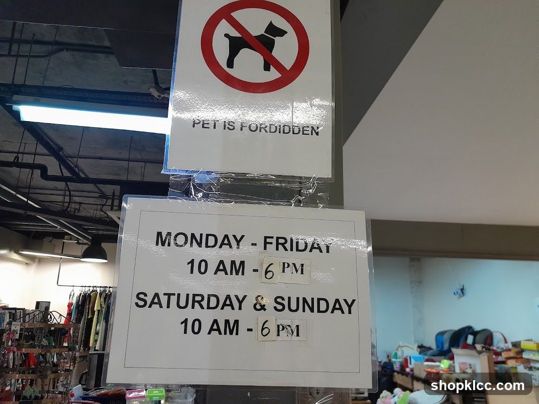 No Pets Sign and Store Hours